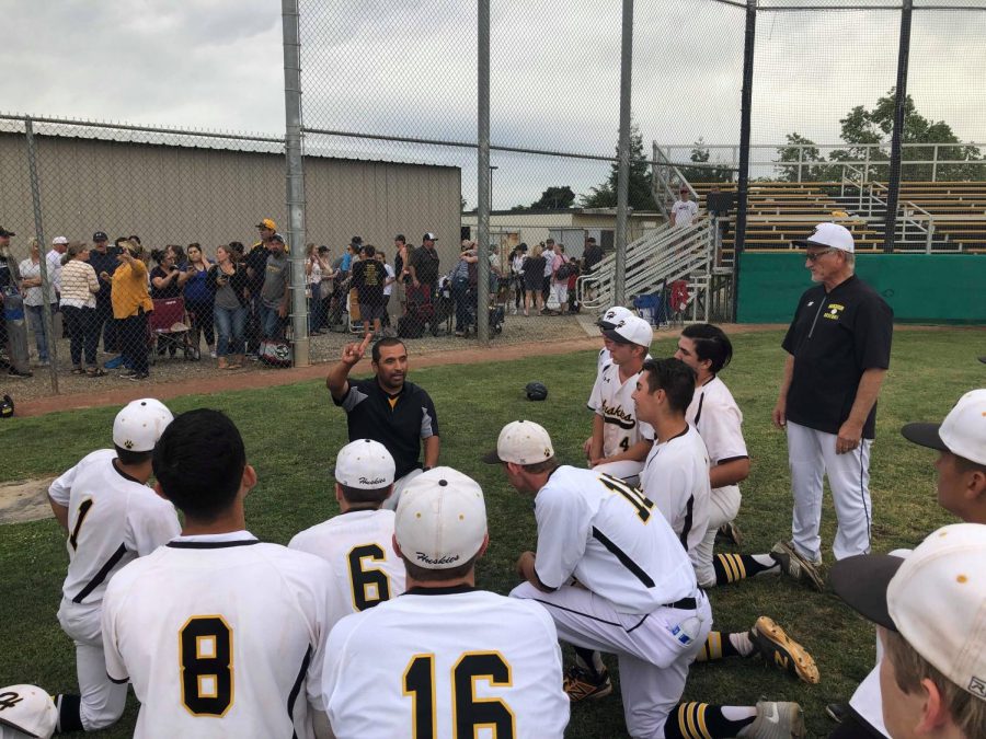 Hughson+High+Baseball+head+coach+Charly+Garza+addresses+his+team+following+a+10-7+win+over+No.+6+Amador